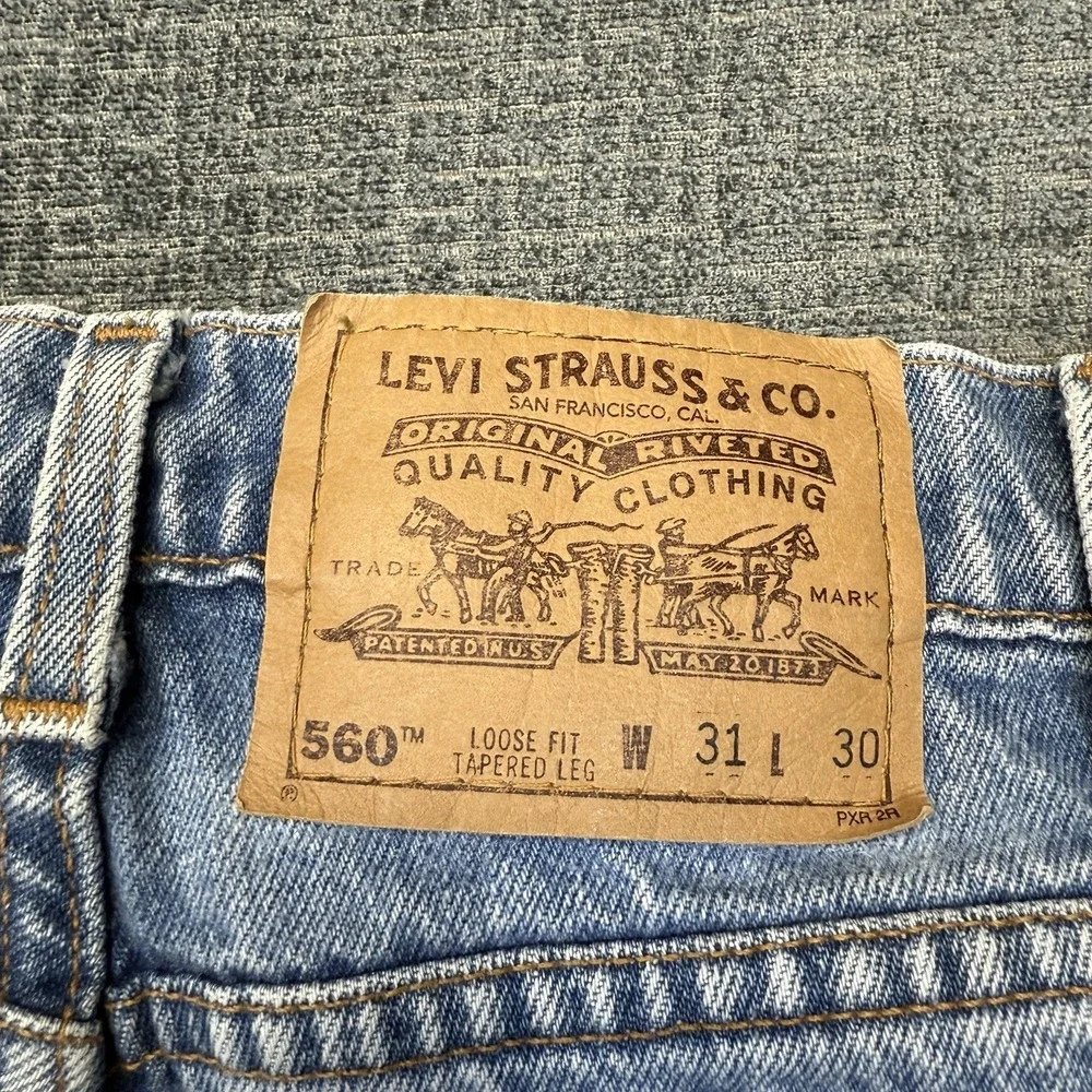 Vintage Levi's 560 Orange Tab Jeans Men's 31x30 Loose Fit Tapered Leg 90's